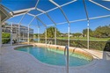 Welcome home to this spaciously designed end unit Villa flooded for sale in Naples Florida Collier County County on GolfHomes.com