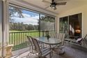 Beautifully maintained, this second-floor end-unit coach home for sale in Estero Florida Lee County County on GolfHomes.com
