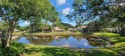 Pond View, spacious second floor furnished 2 bedroom, 2 bath for sale in Palm Harbor Florida Pinellas County County on GolfHomes.com