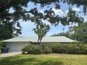Welcome to this spacious 4-bedroom, 3-bath traditional home for sale in St. Petersburg Florida Pinellas County County on GolfHomes.com