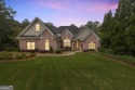 FIRST TIME ON THE MARKET! This exquisite 4-side blush brick for sale in Flowery Branch Georgia Hall County County on GolfHomes.com