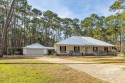 You'll fall in love with this Creole cottage-style home nestled for sale in Dauphin Island Alabama Mobile County County on GolfHomes.com