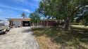 This home is located in Dana Shores - a very popular waterfront for sale in Tampa Florida Hillsborough County County on GolfHomes.com