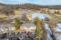 Affordable, move-in-ready walk-in level condo located in Osage for sale in Lake Ozark Missouri Miller County County on GolfHomes.com
