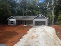 New construction almost completed! Located in Turtle Cove for sale in Monticello Georgia Jasper County County on GolfHomes.com