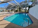 Affordable POOL HOME overlooking the GOLF COURSE. Pay as you for sale in Lehigh Acres Florida Lee County County on GolfHomes.com