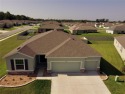 Welcome to the serene Deer Path community!   This 4-bedroom for sale in Ocala Florida Marion County County on GolfHomes.com