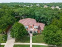 Stunning 2 Story Home with a beautiful backyard located in the for sale in Cedar Hill Texas Dallas County County on GolfHomes.com