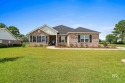 Step inside and prepare to say WOW!!!  This STUNNING 4 bedroom for sale in Foley Alabama Baldwin County County on GolfHomes.com