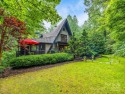 Welcome to your dream mountain getaway in the prestigious for sale in Hendersonville North Carolina Henderson County County on GolfHomes.com