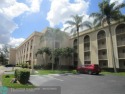 Spacious 1 bedroom, 1.5 bath unit with a large enclosed balcony for sale in Margate Florida Broward County County on GolfHomes.com