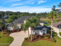 Impressive executive home with magnificent views of the golf for sale in Fleming Island Florida Clay County County on GolfHomes.com