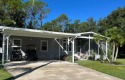 Luxurious one-of-a-kind showplace in the Hamptons Golf and for sale in Auburndale Florida Polk County County on GolfHomes.com
