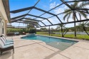 LIVE A VACATION LIFESTYLE IN THE QUARRY! This immaculate for sale in Naples Florida Collier County County on GolfHomes.com