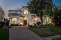 Experience refined Mediterranean-inspired living in this for sale in Irving Texas Dallas County County on GolfHomes.com