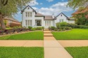 Beautifully maintained home located in the guard-gated community for sale in Irving Texas Dallas County County on GolfHomes.com