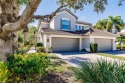 MAGNIFICIENT RENOVATED COACH HOME!   INCLUDES A FULL GOLF for sale in Naples Florida Collier County County on GolfHomes.com