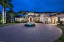 This stunning lake front estate offers sophisticated elegance for sale in Naples Florida Collier County County on GolfHomes.com