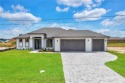 Luxury finishes in a great location. 3 car garage home near for sale in Cape Coral Florida Lee County County on GolfHomes.com