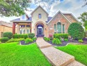 Stunning 5-Bedroom Home with Outdoor Oasis in the Heart of for sale in Carrollton Texas Denton County County on GolfHomes.com