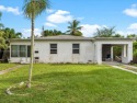 (LOCATION, LOCATION: PRICED TO SELL): This semi-remodeled home for sale in North Miami Beach Florida Miami-Dade County County on GolfHomes.com