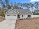 Discover the perfect blend of convenience and style in this for sale in Calabash North Carolina Brunswick County County on GolfHomes.com