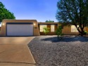 Tucked away in the charming Paradise Hills community, this for sale in Albuquerque New Mexico Bernalillo County County on GolfHomes.com