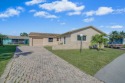 This well-built 2BR/2BA, 1 car garage CBS single-family home for sale in Lake Worth Florida Palm Beach County County on GolfHomes.com