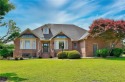 Experience luxury and comfort in this stunning ranch-style home for sale in Smithfield Virginia Isle of Wight County County on GolfHomes.com