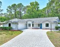 Light-Filled Designer Pool Home | New Roof | Gourmet Kitchen | for sale in Palm Coast Florida Flagler County County on GolfHomes.com