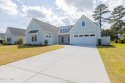 This nearly new ''Shoal'' with farmhouse elevation overlooks a for sale in Hardeeville South Carolina Jasper County County on GolfHomes.com