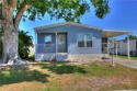 Like new! Enjoy this adorable 3 bedroom/ 2 bath home with a for sale in Barefoot Bay Florida Brevard County County on GolfHomes.com