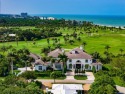 Elegant and relaxed seaside estate situated on almost an acre for sale in Vero Beach Florida Indian River County County on GolfHomes.com