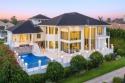 Beautiful Art Deco-style waterfront home boasts a for sale in Boca Raton Florida Palm Beach County County on GolfHomes.com