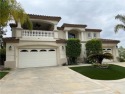 This Mediterranean Estate Home is located in the Vista Del Verde for sale in Yorba Linda California Orange County County on GolfHomes.com
