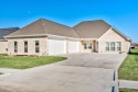 This newly constructed brick home sits on Babe Zaharius Golf for sale in Port Arthur Texas Jefferson County County on GolfHomes.com