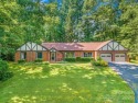 Private and stately ranch home on a quiet cul-de-sac in the for sale in Hendersonville North Carolina Henderson County County on GolfHomes.com