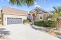 Nestled in the coveted Ocean Ridge Plantation, this custom-built for sale in Ocean Isle Beach North Carolina Brunswick County County on GolfHomes.com