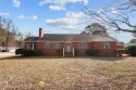 Spacious 3 bedroom, 2 bath brick ranch with garage and bonus for sale in Rocky Mount North Carolina Nash County County on GolfHomes.com