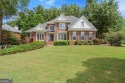 Experience resort-style living perfectly positioned on a private for sale in Canton Georgia Cherokee County County on GolfHomes.com