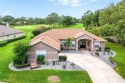 PRICE IMPROVEMENT:  Experience elegance and comfort in this for sale in Mount Dora Florida Lake County County on GolfHomes.com