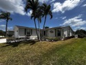 Looking for a three  bedroom two bathroom home on the water for sale in Port Saint Lucie Florida Saint Lucie County County on GolfHomes.com