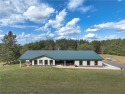 Spacious custom home that has been completely redesigned and for sale in Iron River Wisconsin Bayfield County County on GolfHomes.com
