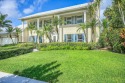 Welcome to a truly unique two-story Southern Colonial home for sale in Deerfield Beach Florida Broward County County on GolfHomes.com