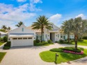 Exquisite custom-built residence completed in 2019, offering 4 for sale in Jupiter Florida Palm Beach County County on GolfHomes.com