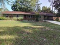 Don't miss this one! Beautifully shaded, freshly painted, well for sale in Crawfordville Florida Wakulla County County on GolfHomes.com