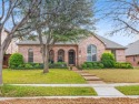 PRICE REDUCTION! Stunning 1 and a half story brick, (Highland for sale in Lewisville Texas Denton County County on GolfHomes.com