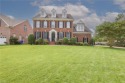 Lovely, three-story traditional, all-brick home situated on a for sale in Suffolk Virginia Suffolk County County on GolfHomes.com