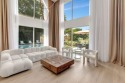 Welcome to this recently updated luxurious country club retreat for sale in Boca Raton Florida Palm Beach County County on GolfHomes.com