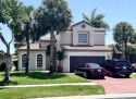 Totally renovated lakefront house at Boca Pointe Country Club for sale in Boca Raton Florida Palm Beach County County on GolfHomes.com